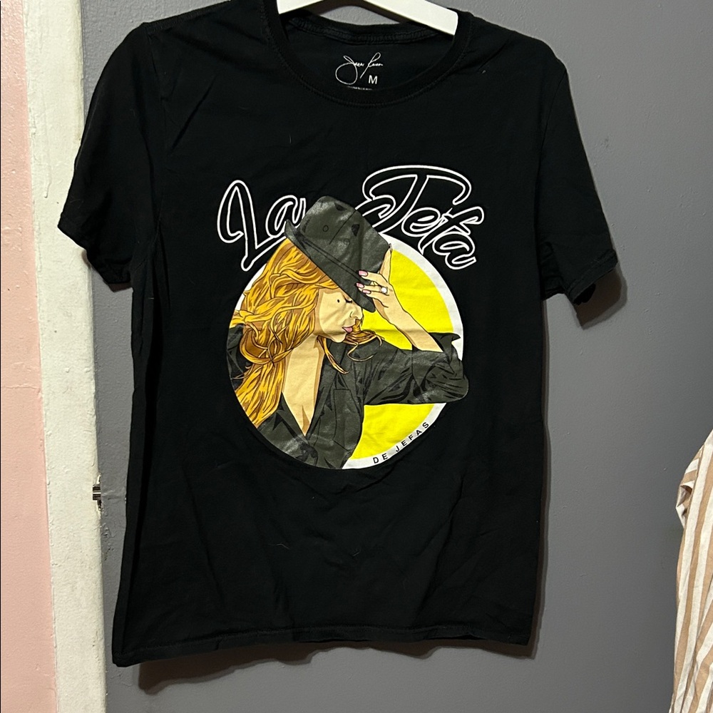 Black Graphic T-Shirt with Yellow and White Design by Jenni Rivera fashion